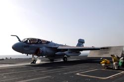 120514-N-MK401-185 ARABIAN SEA (May 14, 2012) An EA-6B Prowler assigned to the Lancers of Electronic Attack Squadron (VAQ) 131 launches from the flight deck of the Nimitz-class aircraft carrier USS Abraham Lincoln (CVN 72). Lincoln is deployed to the U.S. 5th Fleet area of responsibility conducting maritime security operations, theater security cooperation efforts and support missions as part of Operation Enduring Freedom. (U.S. Navy photo by Mass Communication Specialist Seaman Mason D. Campbell/Released